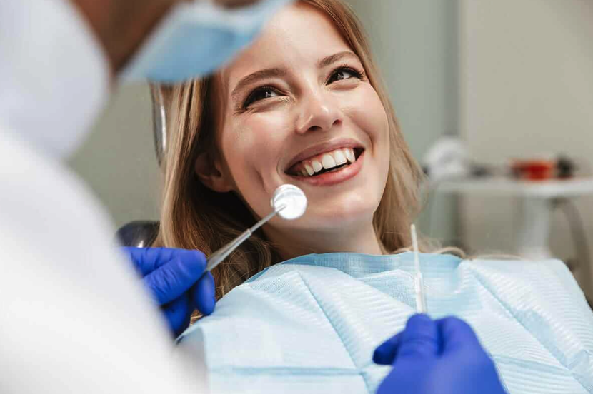Patient smiling comfortably during a dental visit
