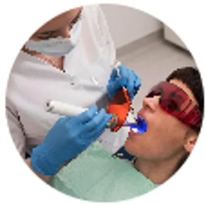 Patient receiving gentle periodontal treatment